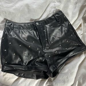 Black faux leather jeweled shorts